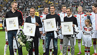 Abgang als Weltmeister: Mertesacker, Flick, Klose und Lahm (v.l.) © GES/Markus Gilliar