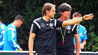Thomas Schneider and manager Joachim Löw in training before the match tonight. © 2015 Getty Images