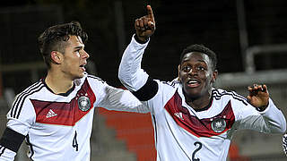 Malcolm Badu celebrates his goal with Robin Ziegele  © 2015 Getty Images