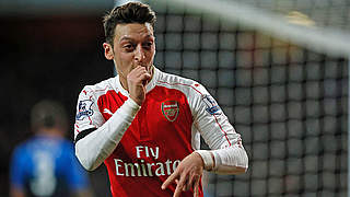 Mesut Özil fell one assist short of equalling the Premier League record this season © Getty Images