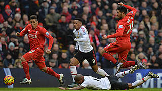 Manchester United beat Can's Liverpool with late strike © 