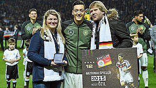 Mesut Özil was presented the award by Lena Kleiner and Tobias Obitz © Getty Images