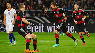 Reason to be cheerful: Götze and his Germany team-mates © Bongarts/GettyImages