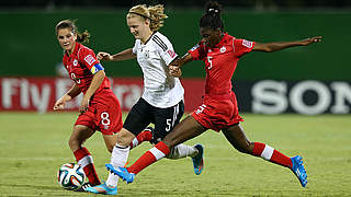 Scoring the equaliser for Germany’s U-17s: Kim Fellhauer (centre) © FIFA