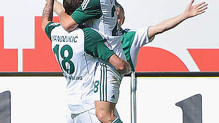 Wolfsburg celebrating: Victory over Köln © Bongarts/GettyImages