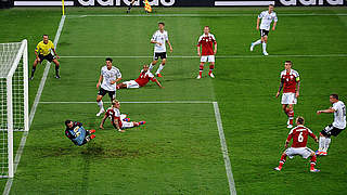 A special goal: Podolski scores against Denmark © Bongarts/GettyImages