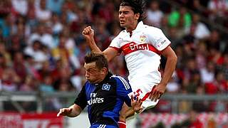 Stuttgart defender Serdar Tasci (r.) clears against Ivica Olic © Bongarts/GettyImages