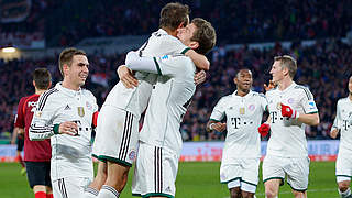 Celebrate scoring their first goal: Mueller and Munich © Bongarts/GettyImages