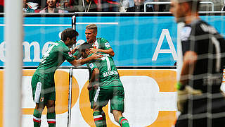 Celebration in Augsburg: three points against Stuttgart © Bongarts/GettyImages