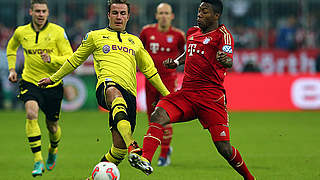 No surrender: Mario Götze (left) against Bayerns David Alaba © Bongarts/GettyImages