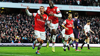 Pure elation: Podolski (l.) celebrates his goal © Bongarts/GettyImages