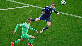 Off his line to good effect: Manuel Neuer beats Islam Slimani to the ball. © Bongarts/GettyImages