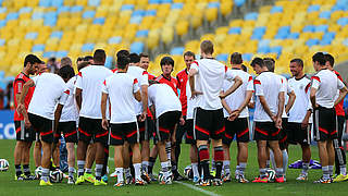 Löw (centre) addresses his players prior to the quarter-final © Bongarts/GettyImages